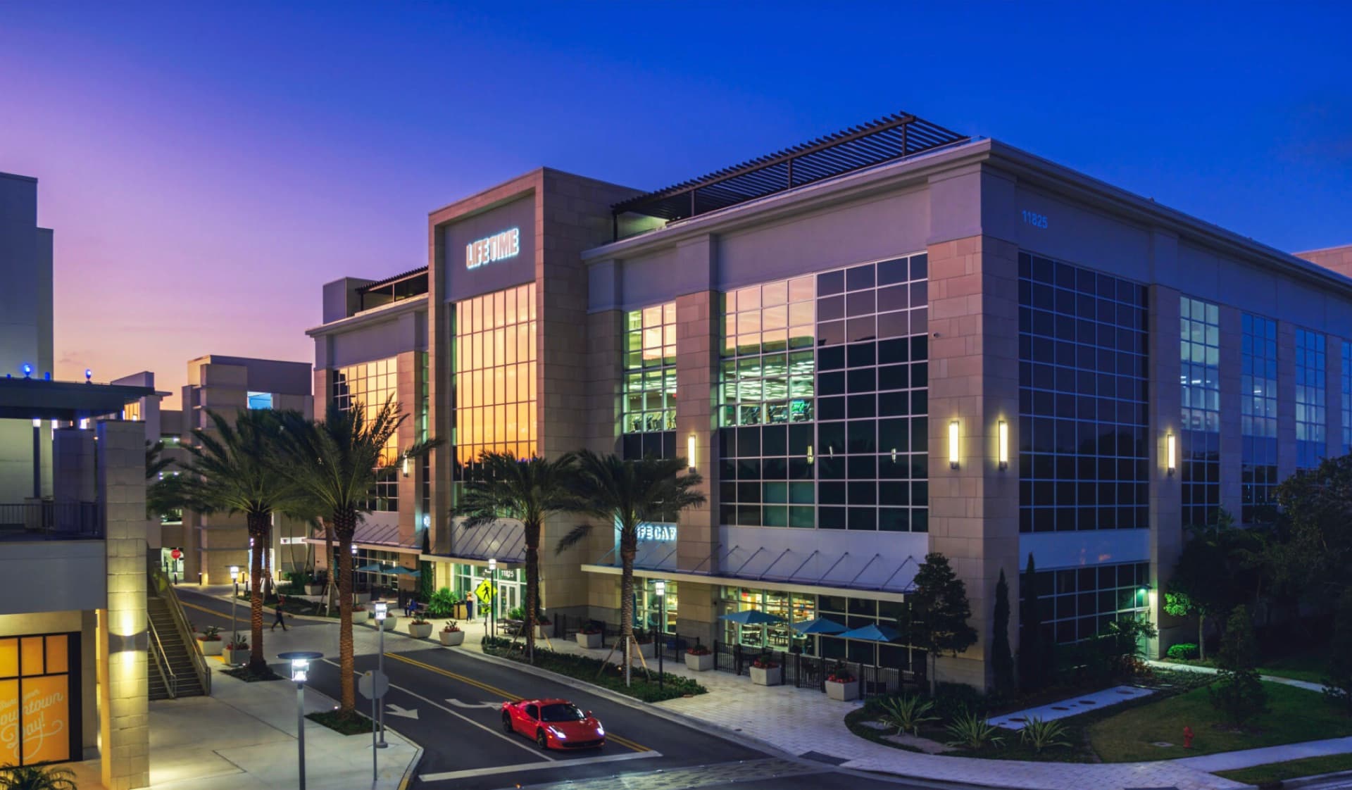 Life Time at Downtown Palm Beach Gardens at dusk, a completed GMFI commercial project