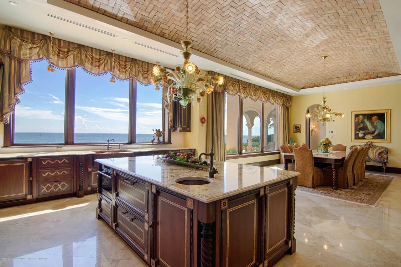 Mediterranean kitchen with ocean views and barrel ceiling