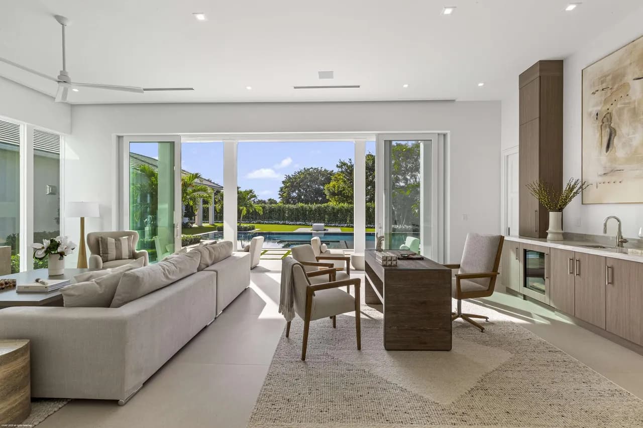 Club room bar with wine storage and marble counters